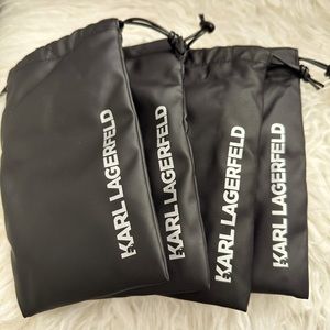 Karl Lagerfeld Sunglass pouches never used. Set of 4.